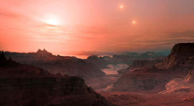 La visione artistica di un pianeta con tre Soli